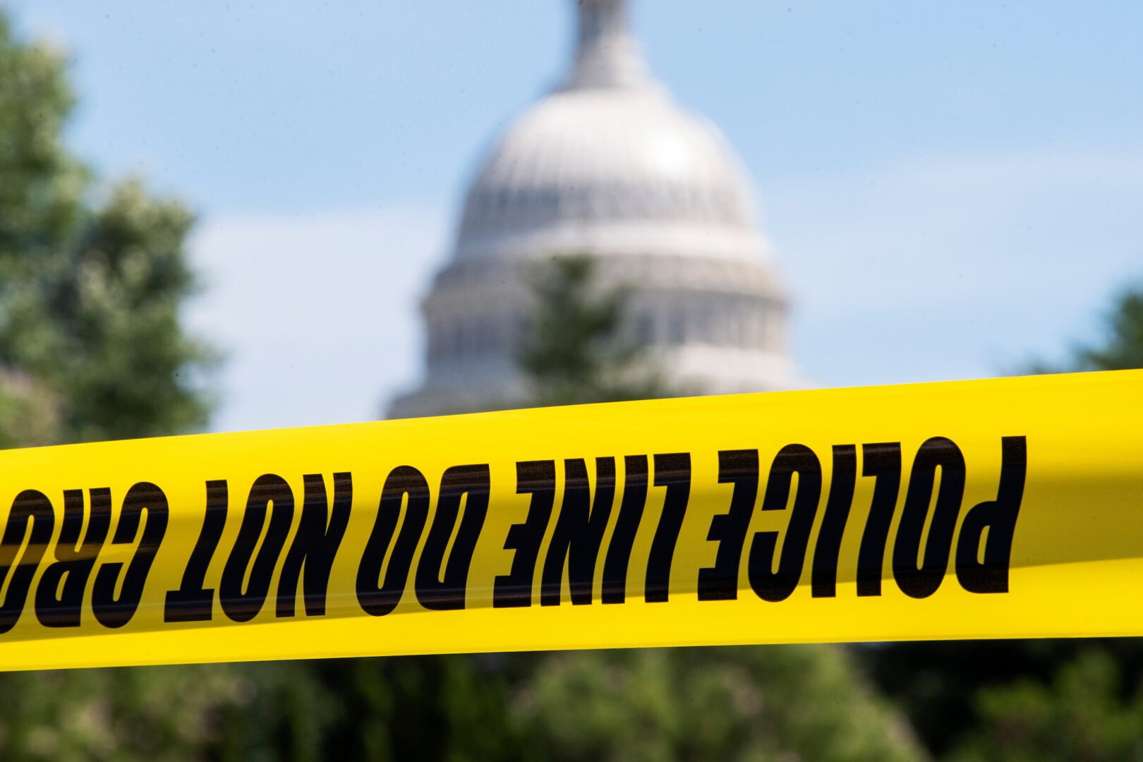 Man arrested at Capitol barricade had a gun in his lap, police say